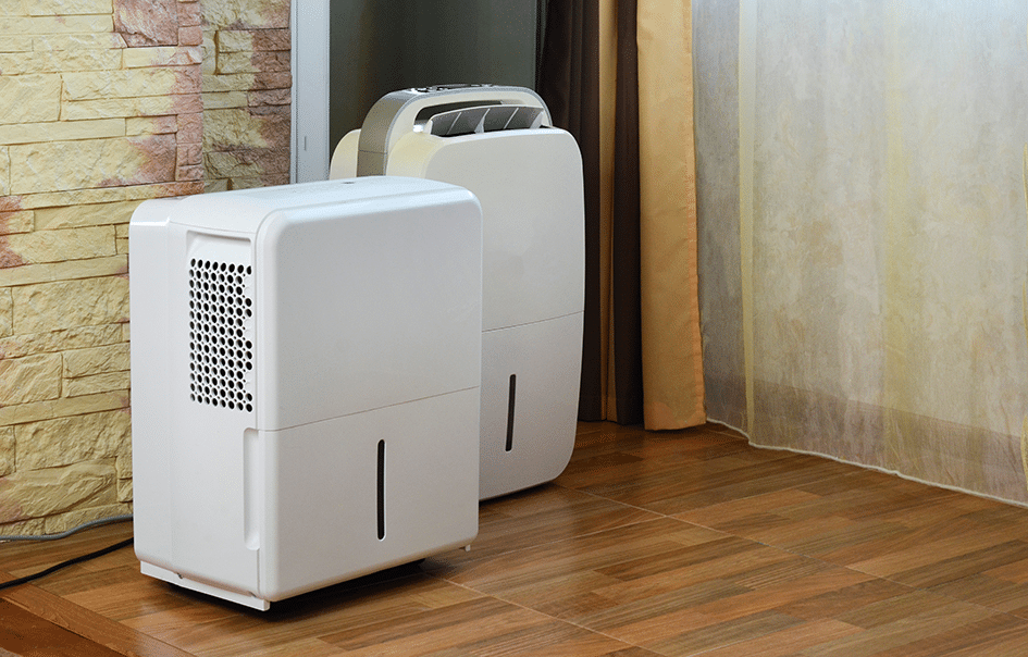 two dehumidifiers side by side