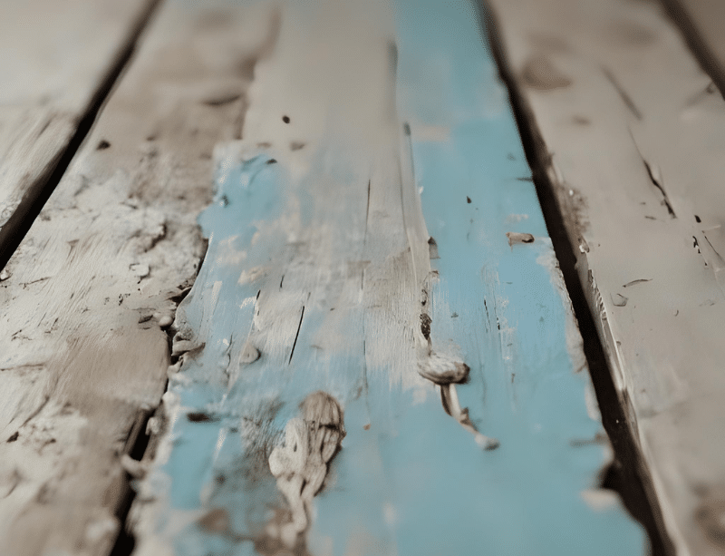 Shabby floor board painted blue