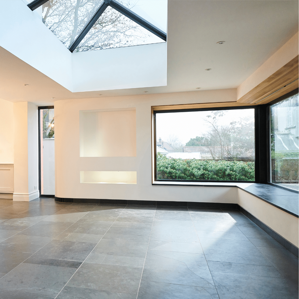 Modern kitchen extension with lantern room and panoramic corner window